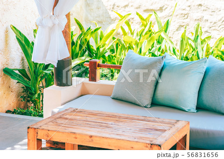 Pillow on sofa chair decoration outdoor patio with garden view 56831656