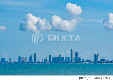 Beautiful landscape of sea with Pattaya cityscape and white cloud on blue sky Beautiful landscape of sea with Pattaya cityscape and white cloud on blue sky 56831704