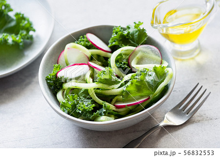 Vegan green salad with kale, cucumber and radish Vegan green salad with kale, cucumber and radish 56832553
