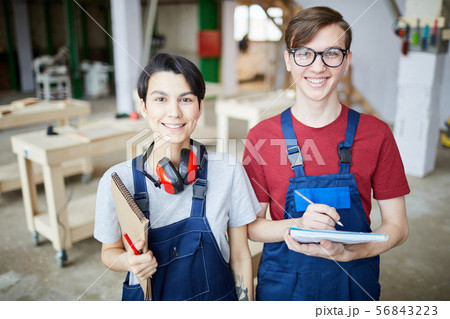 Two Young Workers at Factory 56843223