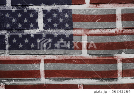 USA flag painted on old brick wall texture 56843264