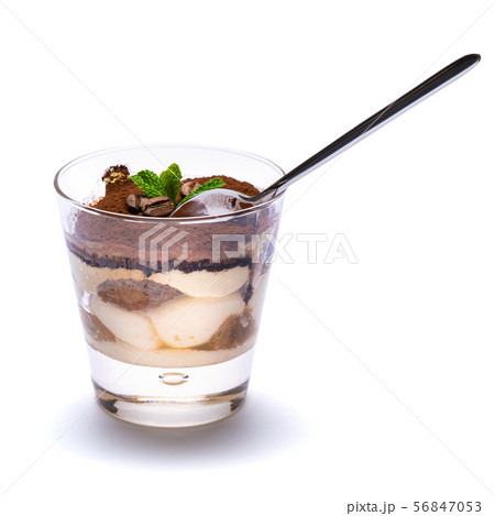 Classic tiramisu dessert in a glass cup on the plate on white background with clipping path Classic tiramisu dessert in a glass cup on the plate on white background with clipping path 56847053