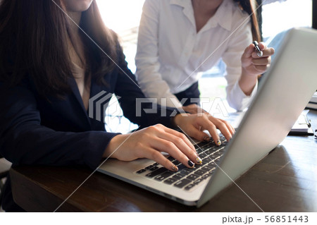 Woman talking with colleague about new startup. 56851443