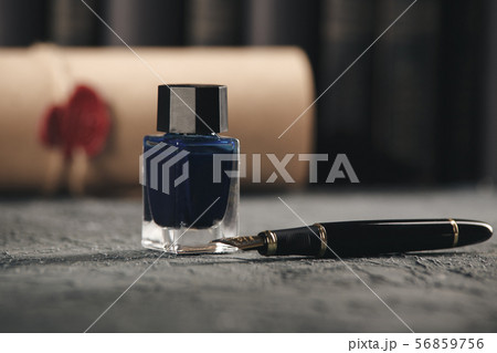 Lawer and notery concept. Pen-juice and pen on the table. 56859756