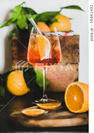 Aperol Spritz cocktail in glass with eco-friendly Aperol Spritz cocktail in glass with eco-friendly 56861492