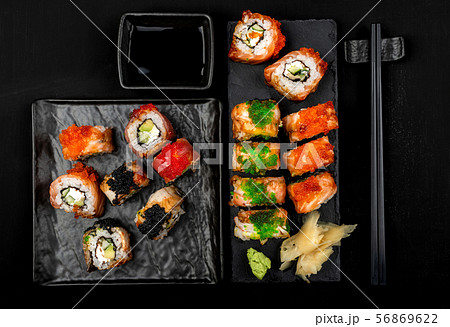 Set of sushi rolls on stone table. Top view with copy space. Set of sushi rolls on stone table. Top view with copy space. 56869622
