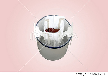 Drip bag fresh coffee on cup . OJECT 56871704