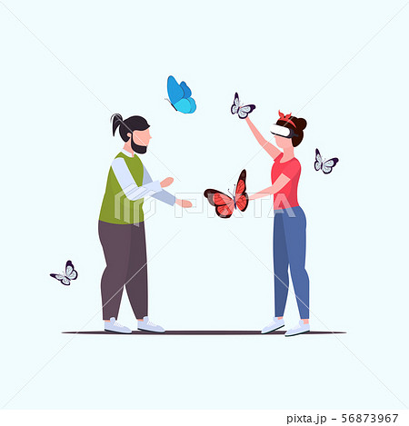 man looking at woman wearing digital glasses girl touching vr flying butterfly from smartphone 56873967