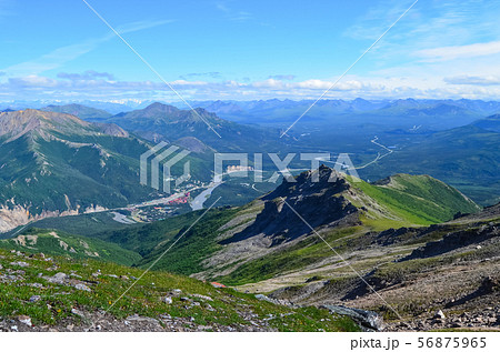 View of Nenana river valley from Mount Healy hike trail with blue sky with white clouds above 56875965