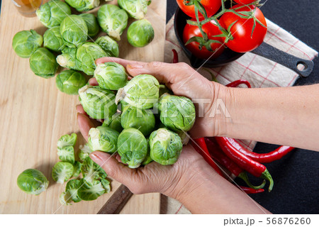 close-up of Brussels sprouts on wooden table 56876260