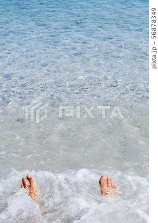 young man relaxing on the seashore. 56878349