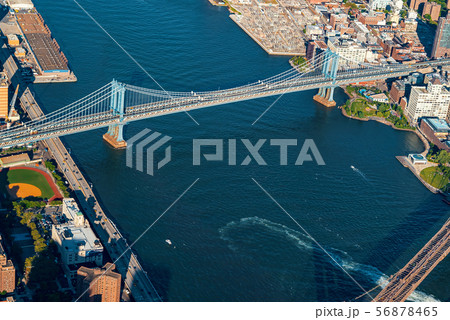 Aerial view of NY with a view of the Brooklyn and Manhattan Bridges Aerial view of NY with a view of the Brooklyn and Manhattan Bridges 56878465