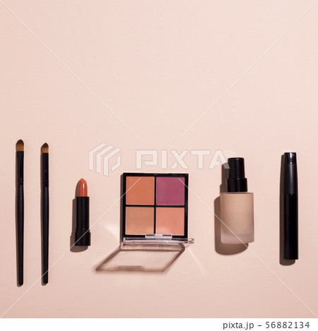 Perfectionism in decorative cosmetic for woman makeup on pink Perfectionism in decorative cosmetic for woman makeup on pink 56882134