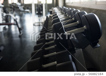Black steel dumbbell in fitness gym Black steel dumbbell in fitness gym 56882164