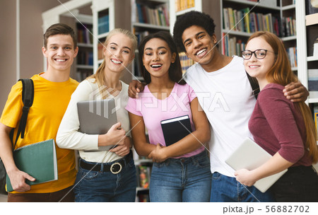 Group of students studying in library at university 56882702