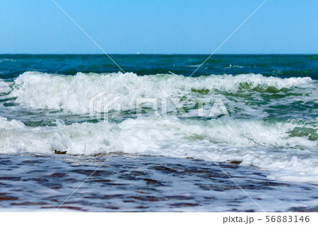 Waves on the sea in a club closeup. Waves on the sea in a club closeup. 56883146