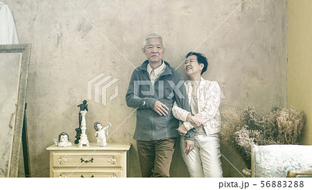 Happy Asian senior couple casual dress with Happy Asian senior couple casual dress with 56883288