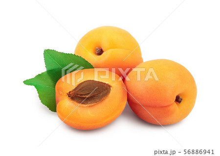 Apricot fruit with half isolated on white background macro 56886941