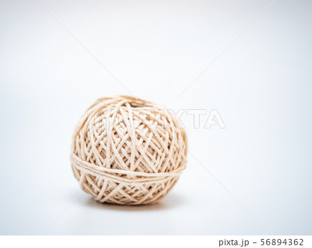 wool ball on light grey background 56894362