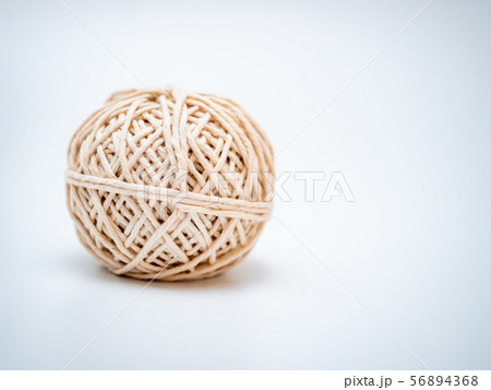 wool ball on light grey background 56894368