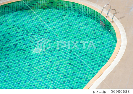 Beautiful outdoor swimming pool in hotel resort for holiday vacation Beautiful outdoor swimming pool in hotel resort for holiday vacation 56900688