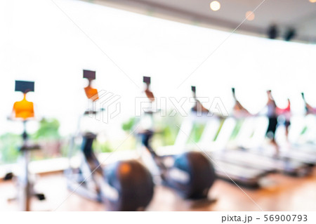 Abstract blur and defocus fitness equipment in gym room interior 56900793