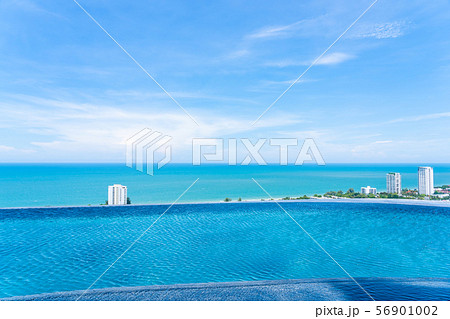 Beautiful outdoor landscape of infinity swimming pool in hotel resort 56901002