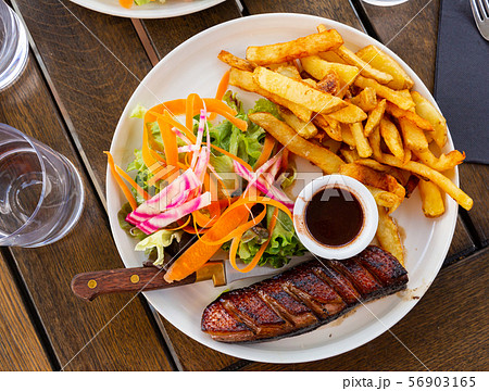 Duck magret breast with raspberry sauce 56903165