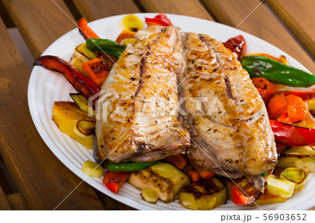Dish of bulgarian cuisine of tasty baked vegetables with mackerel Dish of bulgarian cuisine of tasty baked vegetables with mackerel 56903652