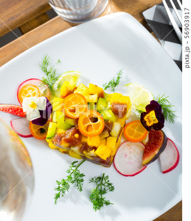 Tasty tartar with fresh tuna, mango, avocado Tasty tartar with fresh tuna, mango, avocado 56903917