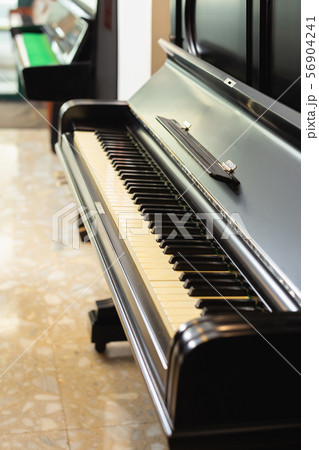 Old wood musical instruments in a store 56904241