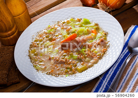 Scottish soup with lamb, root vegetables, pulses and barley 56904260