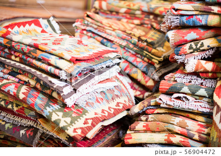 Assortment of colour carpets in the store Assortment of colour carpets in the store 56904472