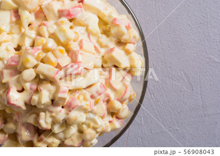 Salad with crab sticks , corn , eggs and Salad with crab sticks , corn , eggs and 56908043