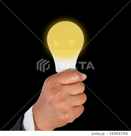 Hand holding light bulb, concept of new ideas with 56908768