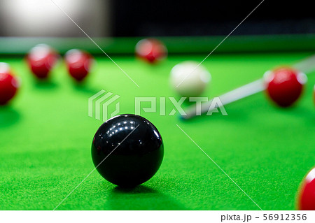 Snooker balls on the green table for playing 56912356