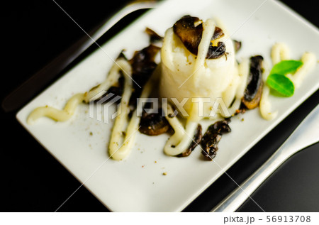 closeup on a rice dish and a mushroom-based sauce, closeup on a rice dish and a mushroom-based sauce, 56913708