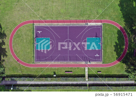 new basketball court in small stadium, aerial 56915471