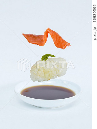 salmon Sushi Japanese food floating on soy sauce cup salmon Sushi Japanese food floating on soy sauce cup 56920596