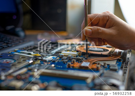 Repairing broken laptop notebook computer Repairing broken laptop notebook computer 56932258