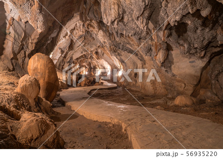 pathway underground cave in Laos, with stalagmites pathway underground cave in Laos, with stalagmites 56935220