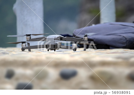 Drones while flying up from the floor with trees Drones while flying up from the floor with trees 56938091