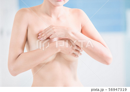 Breast cancer self check concept Breast cancer self check concept 56947319