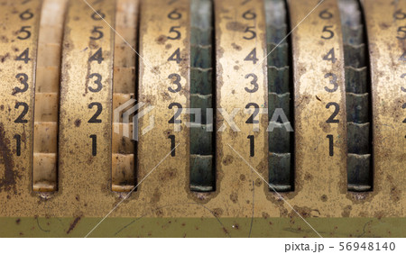 Vintage manual adding machine isolated Vintage manual adding machine isolated 56948140