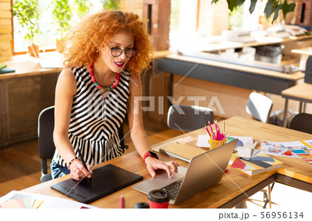 Creative manager using modern technologies at work 56956134