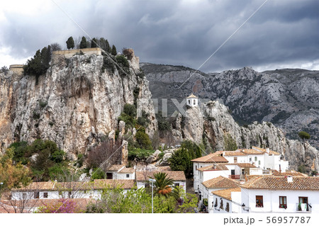 A picturesque town in a mountainous area with ancient history and architectural heritage - Guadalest, Spain 56957787