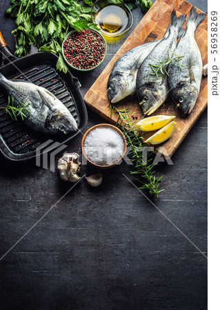 Mediterranean fish bream with spices salt herbs Mediterranean fish bream with spices salt herbs 56958269