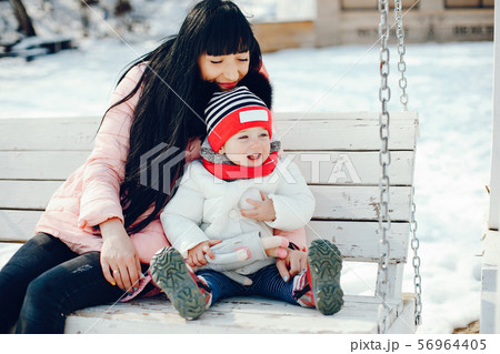 Mother with little daughter 56964405