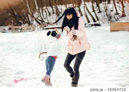 Mother with little daughter 56964729