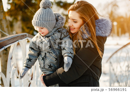 Cute mother with little son Cute mother with little son 56966191